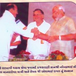 Ramesh Raval with Narendra Modi