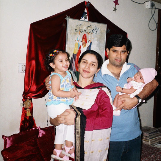 Kamran with his wife and kids