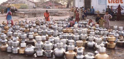 EMPTY POTS QUEUED UP IN LONG WAIT