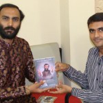Sairam Dave gifting his book