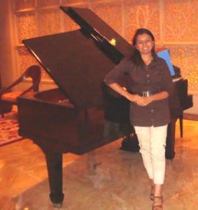 Devanshi Joshi with a Piano