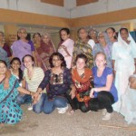 Exchange students and AFS Rajkot volunteers with female residents of Mavtar Vrudhashram Old Age Home